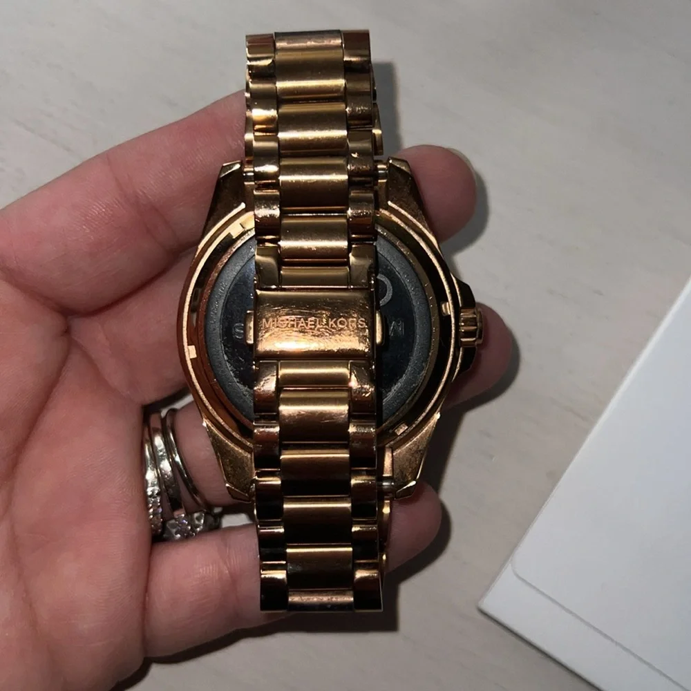 Michael kors smart watch with charger and paperwork